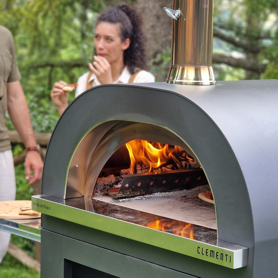 Clementi Gold Pizza oven with people in background_square