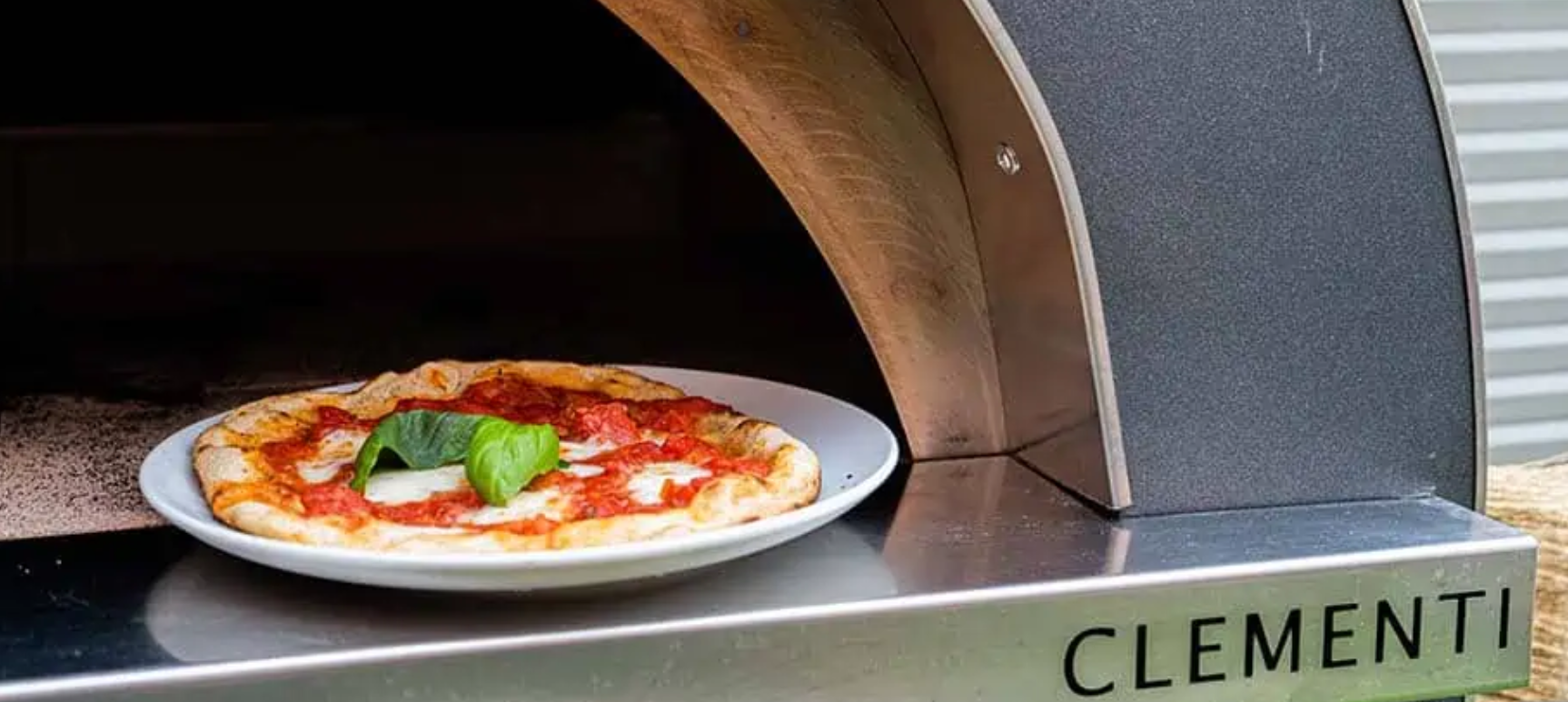 Gold - Clementi_Pizza Oven_close_up with pizza on plate